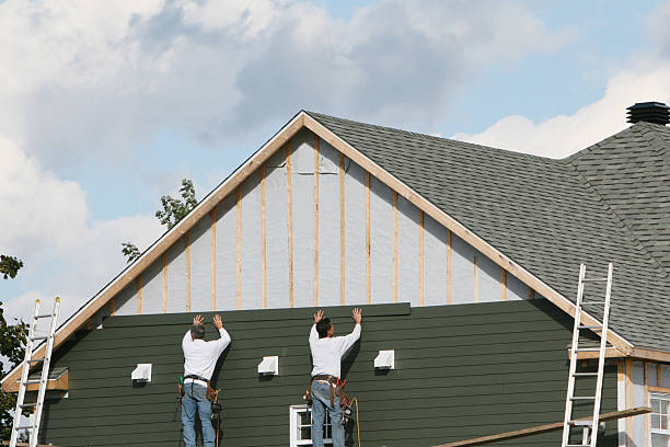 Professional Siding technician working in Bellbrook, OH